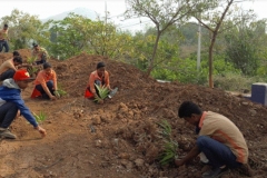 Trainees Maintaining Garden